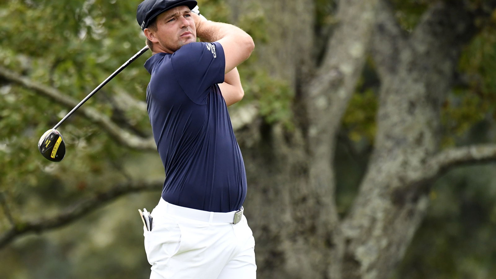 Bryson DeChambeau DENTS a PGA Tour's rep car with his drive!